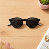 Round Keyhole Sunglasses — Black with Silver Emblem Detail