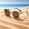 Round Metal Sunglasses — Brushed Gold with Black Temple Tips