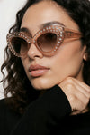 Crystal-Embellished Cat-Eye Sunglasses — Blush Translucent with Rhinestone Trim