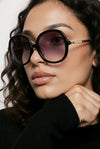 Oversized Round Sunglasses — Black with Gold Hinge Detail